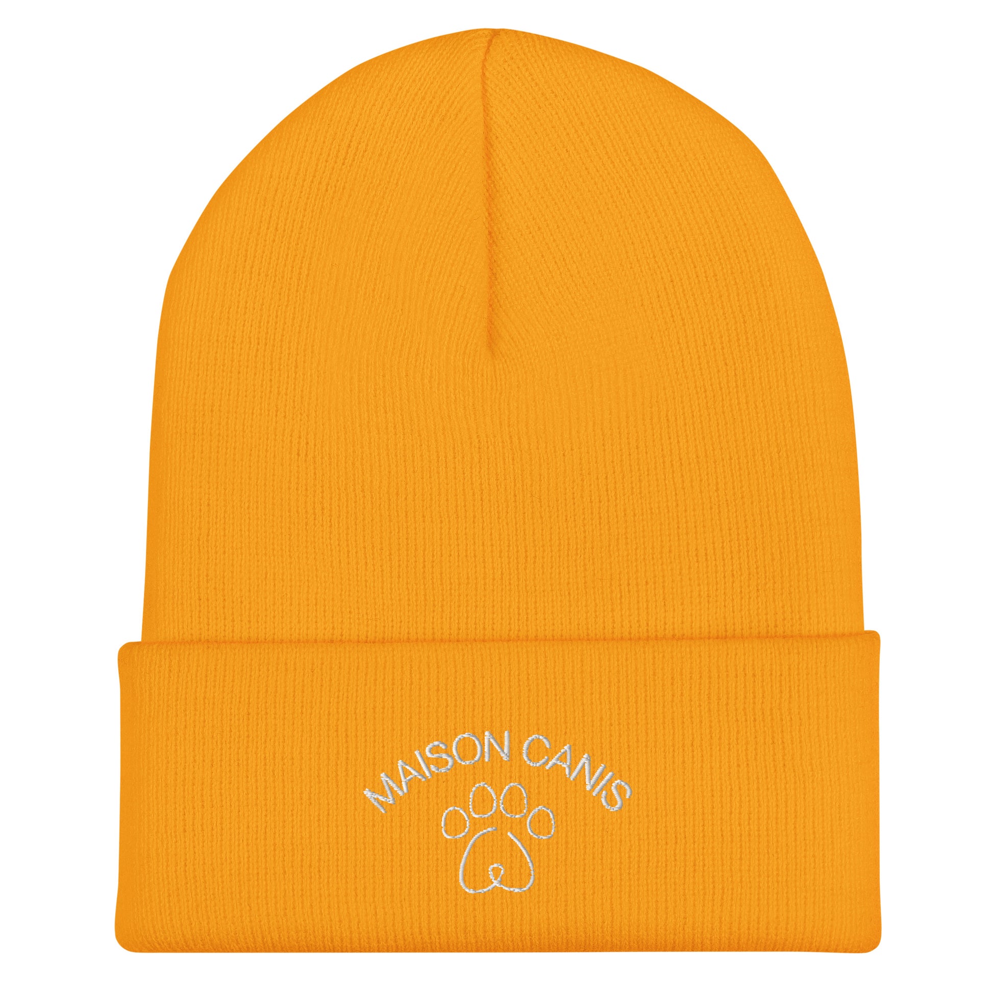 Bonnet Maison Canis jaune avec logo brodé blanc, style hivernal montréalais.